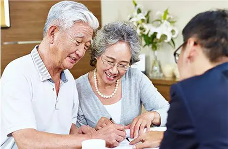 A couple of people sitting at a table